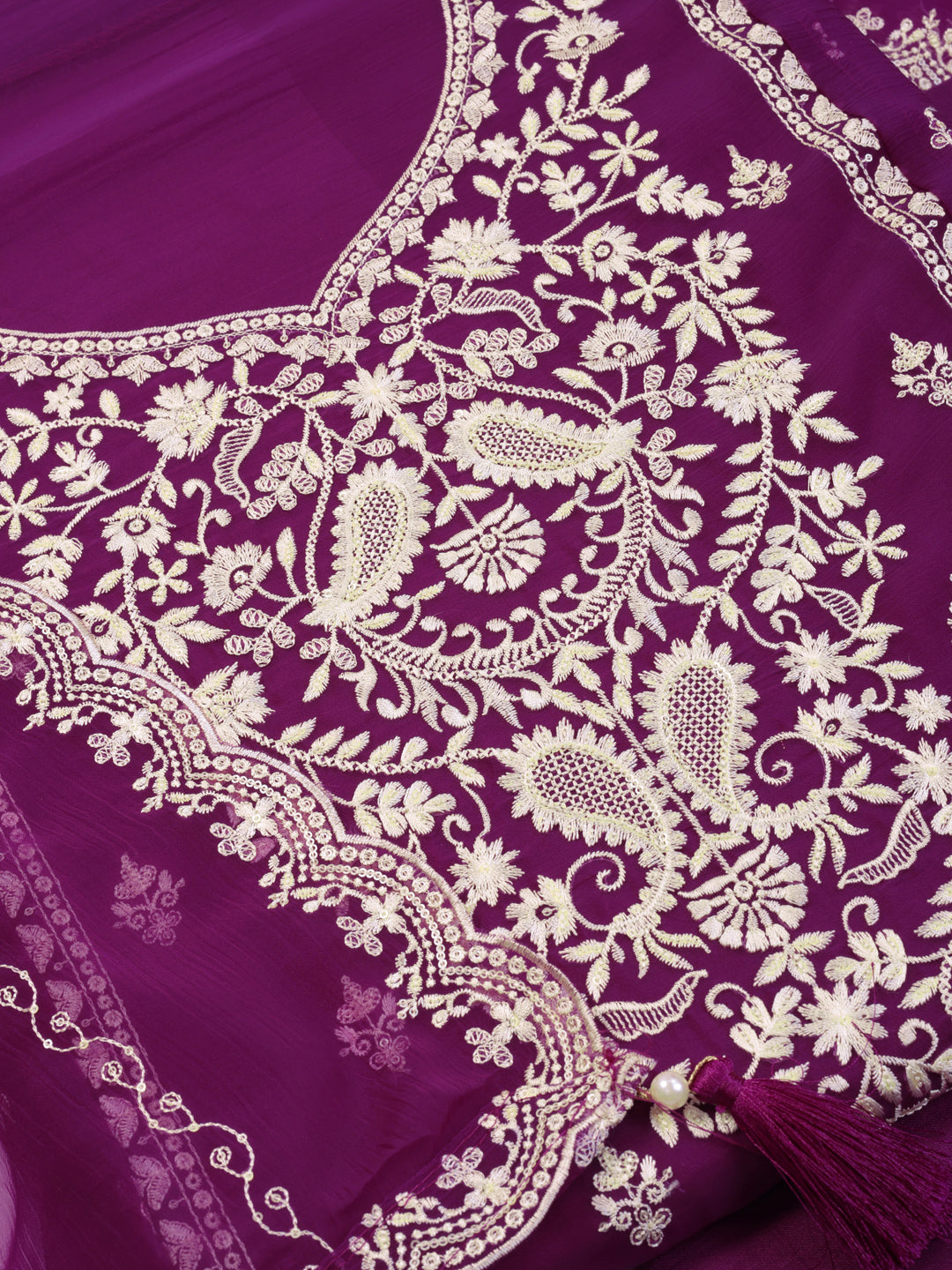 Purple chiffon top with thread embroidery and tassels, unstitched salwar suit.