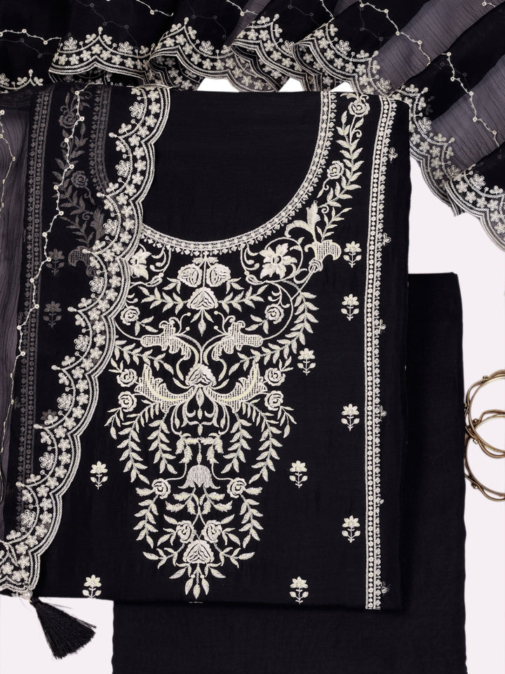 Black chiffon top with thread embroidery and tassels, unstitched salwar suit.