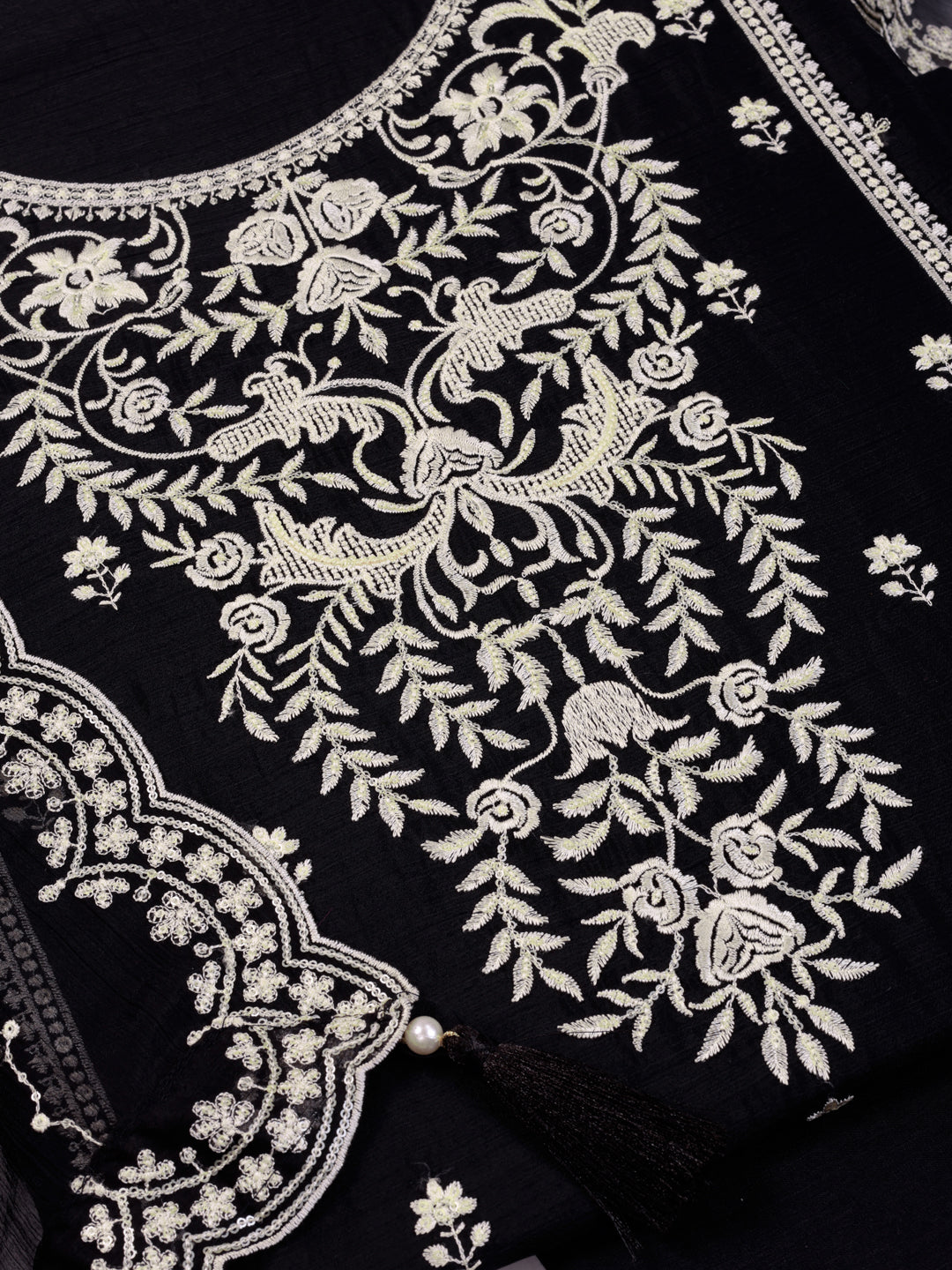 Black chiffon top with thread embroidery and tassels, unstitched salwar suit.